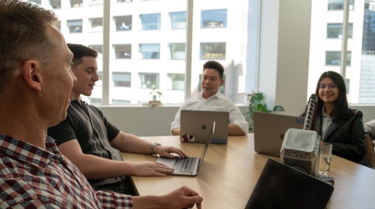 The Bliss team in a meeting